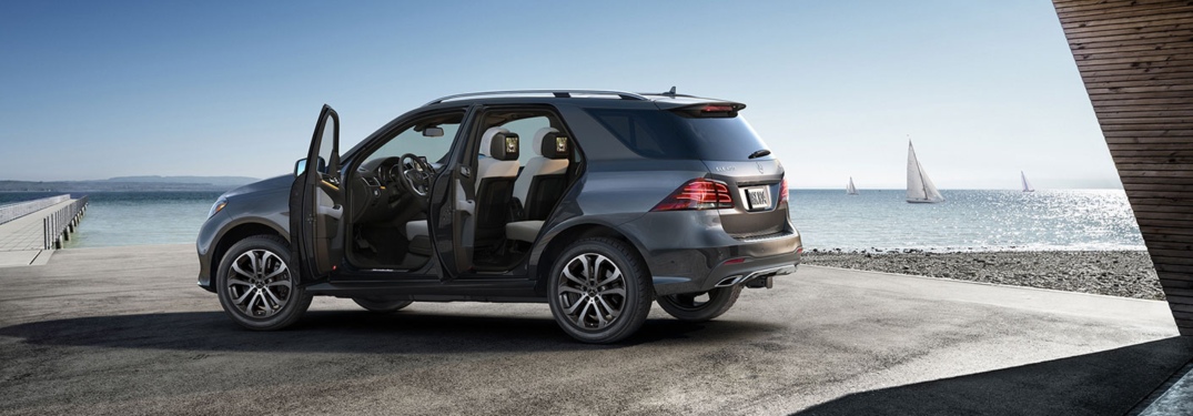 Side view of a 2019 Mercedes-Benz GLE with the doors open