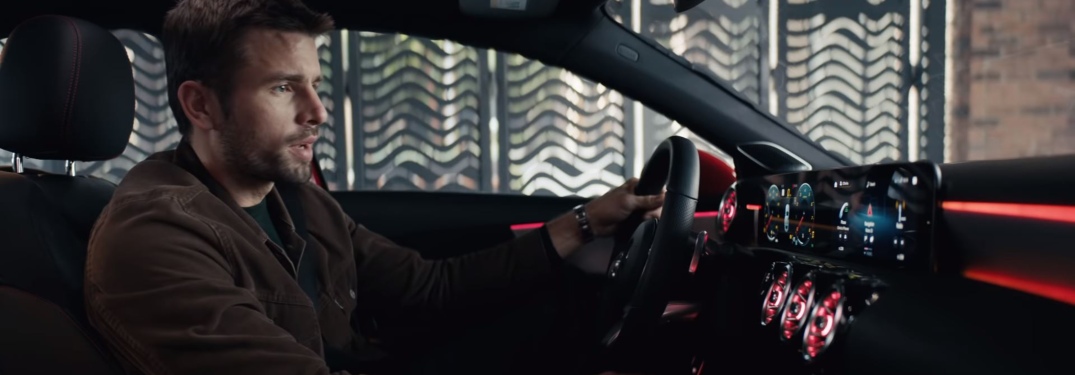 Side view of a man driving the 2019 Mercedes-Benz A-Class