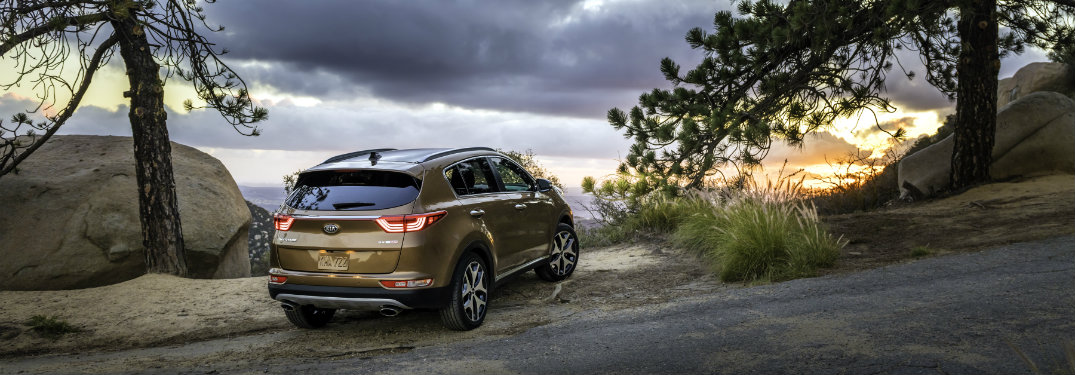 shot of rear of kia sportage in mountains