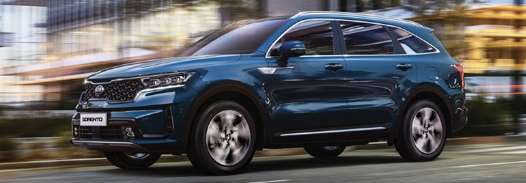 The front and side view of a blue 2021 Kia Sorento.