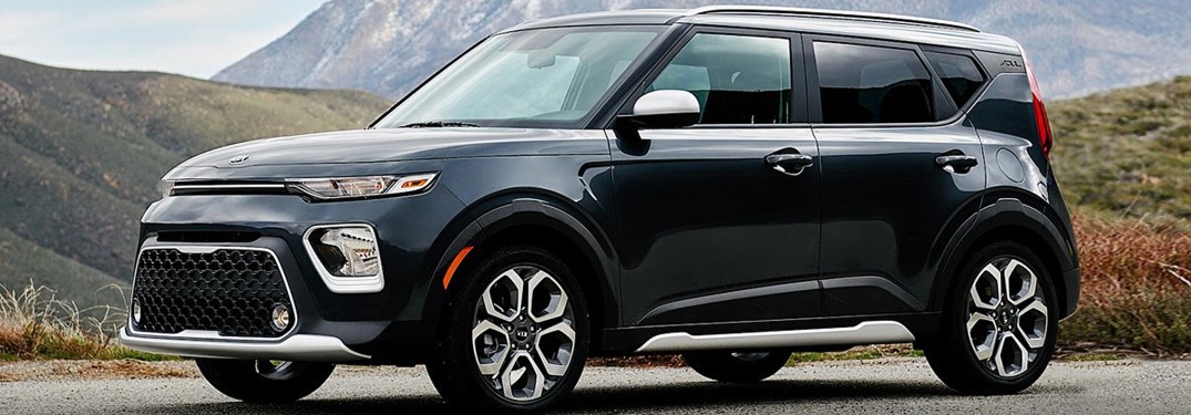 The front and side view of a black 2021 Kia Soul.