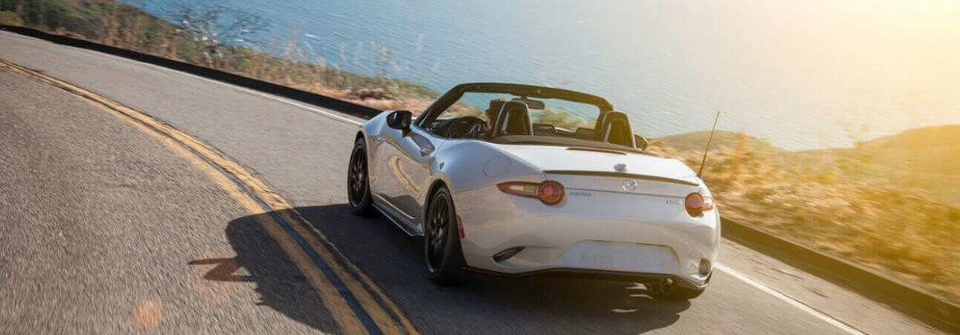 White 2018 Mazda MX-5 Miata Driving on a Coastal Road