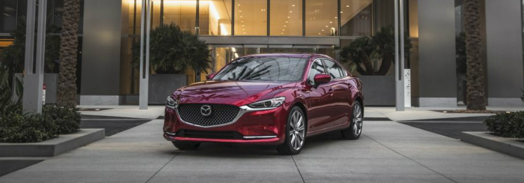 Red 2018 Mazda6 Parked in Front of a Building