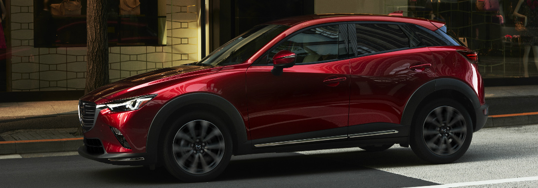 Red 2019 Mazda CX-3 Driving on a City Street