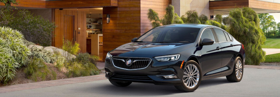 2018 Buick Regal Sportback parked in front of a house