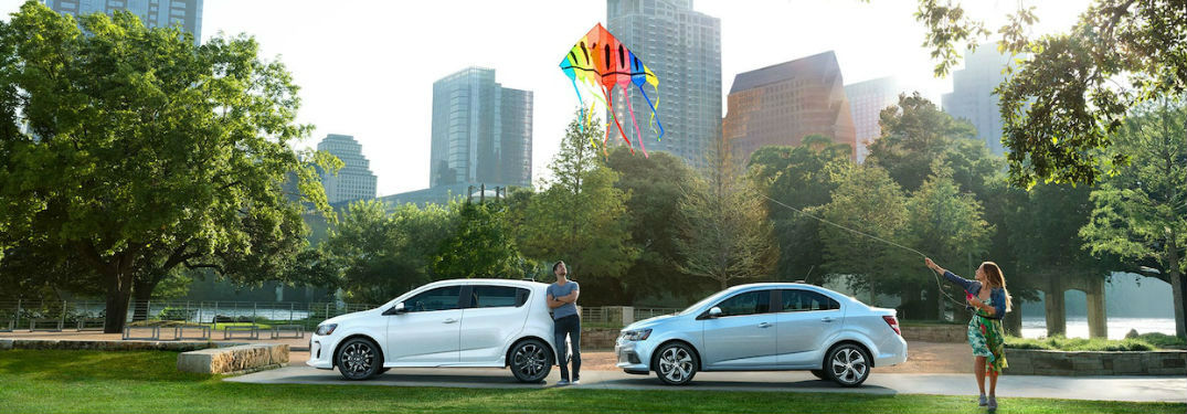 2018 Chevy Sonic sedan an hatchback parked showing side profile