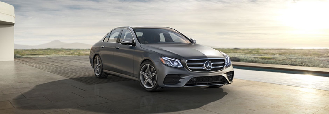 Silver 2018 Mercedes-Benz E-Class parked outside home