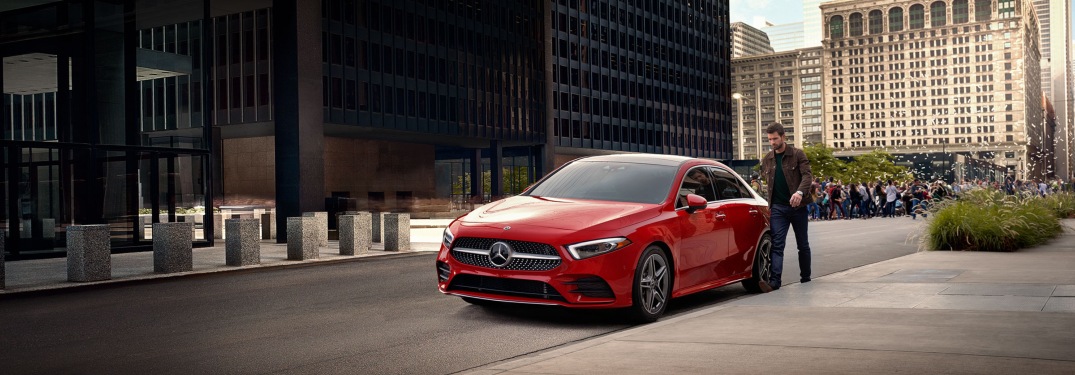 Man standing beside a 2019 Mercedes-Benz A-Class