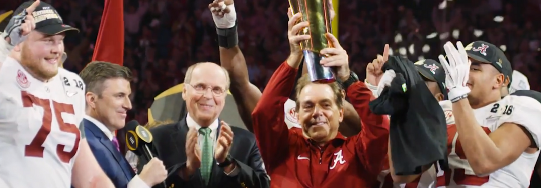 Alabama Crimson Tide coach and players with CFP National Championship Trophy