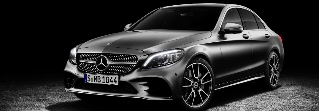 front and side view of 2018 mercedes-benz c 300 sedan against black background