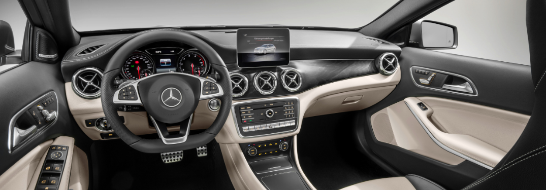 front interior of 2019 mercedes-benz gla 250 suv including steering wheel and infotainment system
