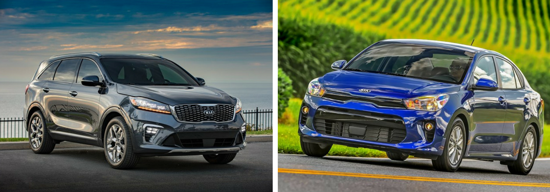 Silver 2019 Kia Sorento and blue 2018 Kia Rio side by side