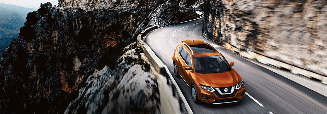 2018 Nissan Rogue driving on a road