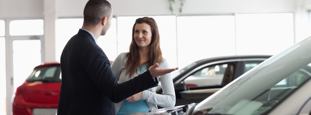 Man Selling car to woman