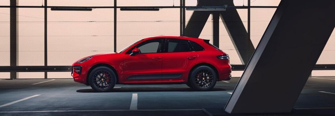 Red Porsche Macan GTS from exterior driver side