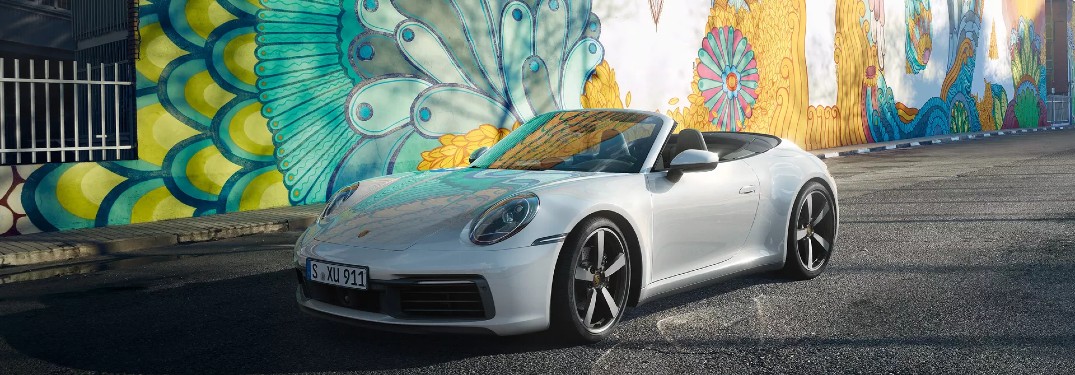 2020 Porsche 911 Carrera in front of painted wall