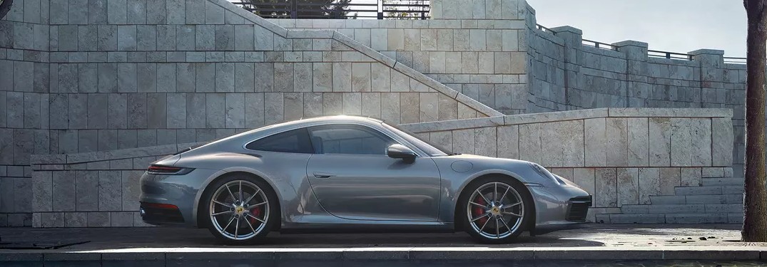 2020 Porsche Carrera parked in front of water