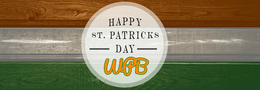 Happy Saint Patrick's Day WPB on wood background