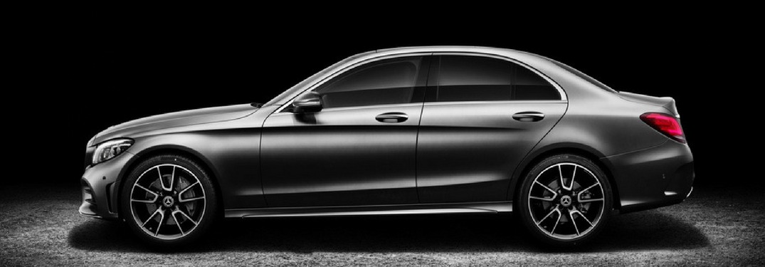 Side profile of the 2019 Mercedes-Benz C-Class in a dark room