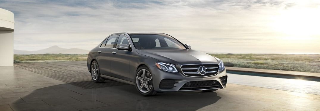 2020 Mercedes-Benz E-Class parked by pool from exterior front passenger side