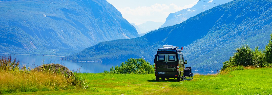 Mercedes-Benz Sprinter Van camper camping in front of mountain