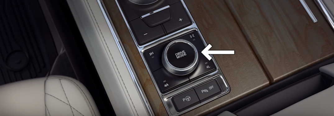 arrow pointing to the drive mode selector knob in a Ford