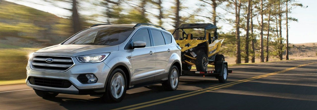 2018 Ford Escape towing a four-wheeler