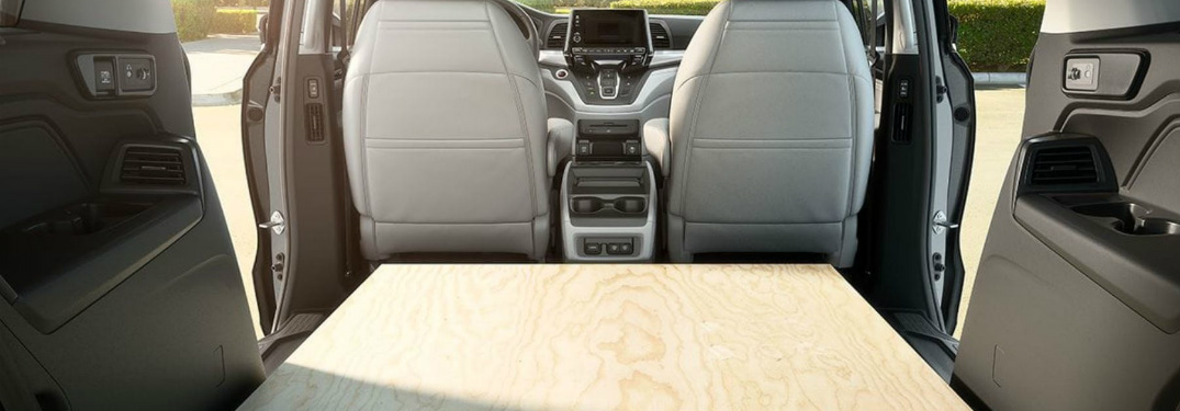 Flat wooden board laying in the back of the 2018 Honda Odyssey