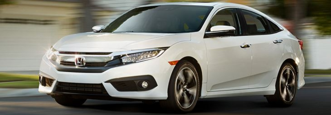 Side view of a white Honda Certified Pre-Owned sedan