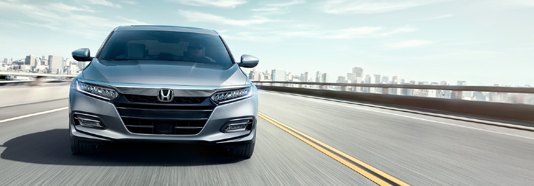 2020 Honda Accord driving toward camera on freeway