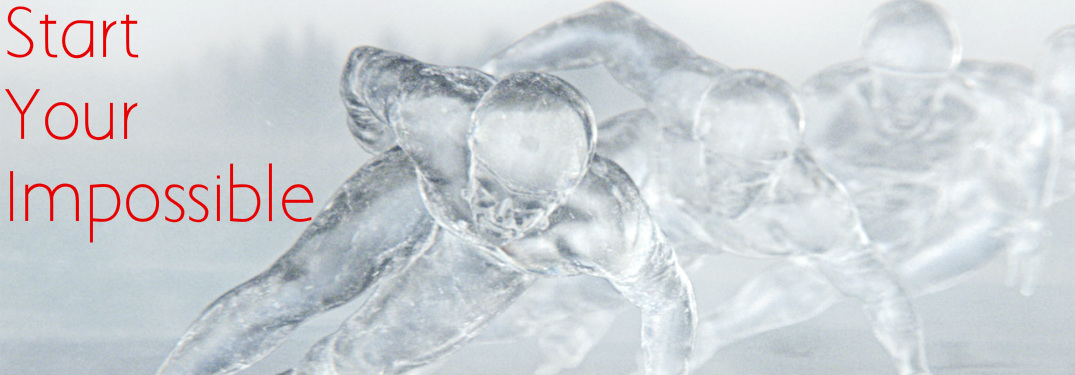 Ice sculptures of Olympic skates with Start Your Impossible text
