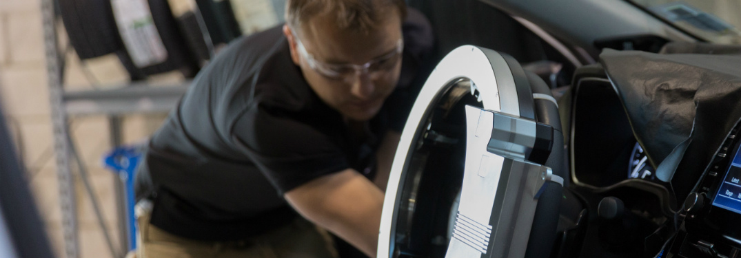 Toyota technician working on autonomous driving technology