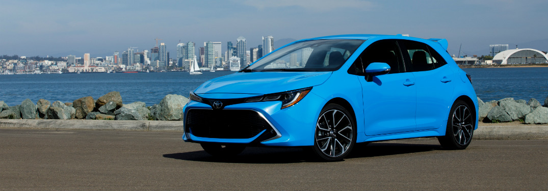 Side view of a blue 2019 Toyota Corolla Hatchback