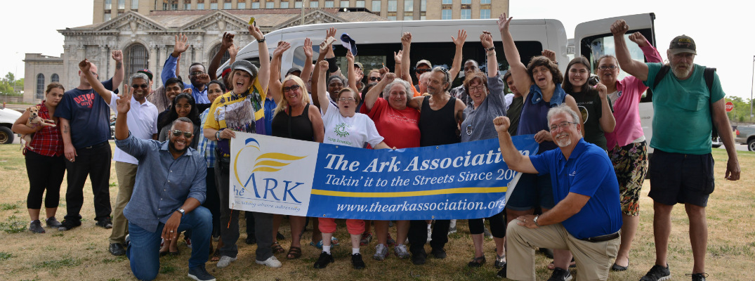 Members of The Ark Association Standing in Front of a Ford Transit Van