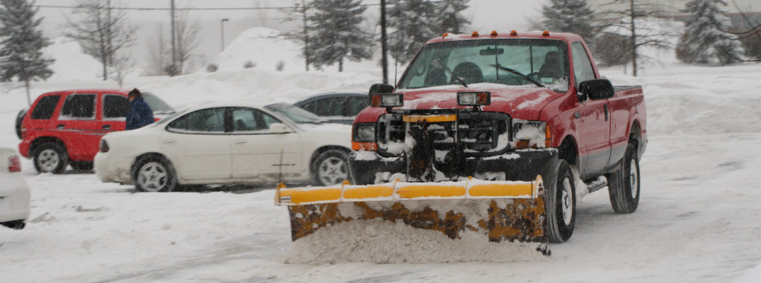 Snowplow on a city road