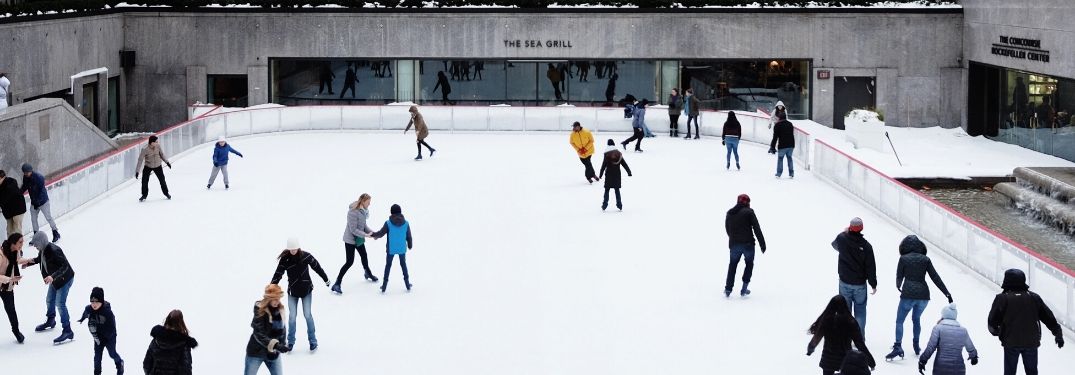 People ice skating together