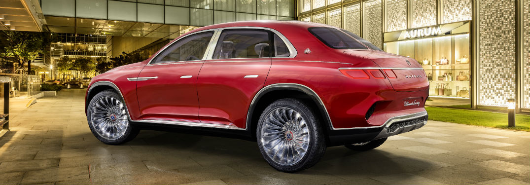 Driver side exterior view of a red Vision Mercedes-Maybach Concept