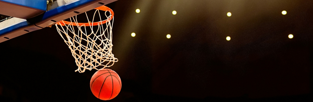 Basketball going through a hoop
