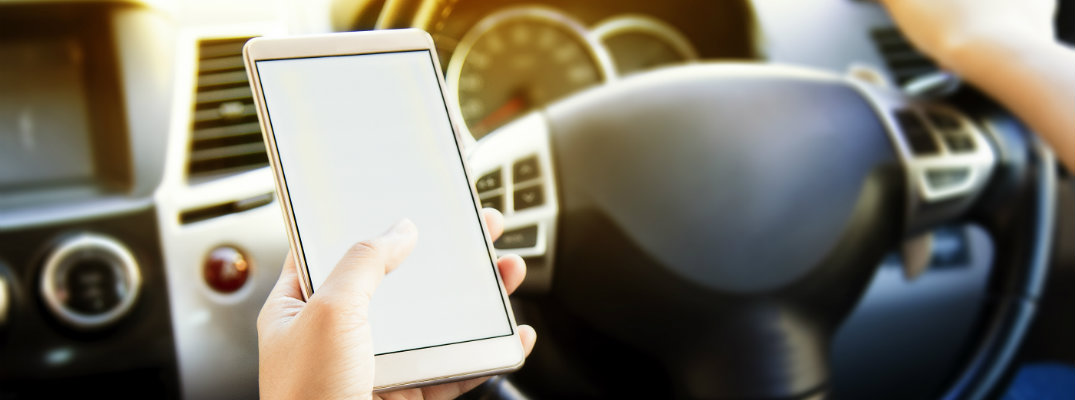 Stock Smartphone while driving with bright exterior blank screen