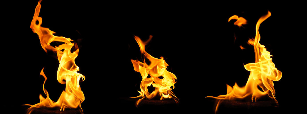 Three Flames in Black Background