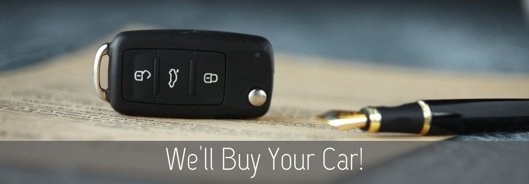 we'll buy your car text with a car key and pen and paper in the background