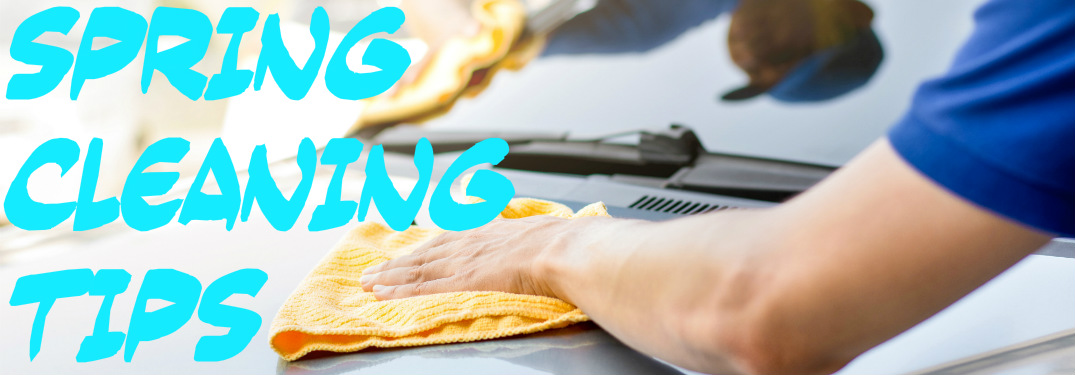 Spring Cleaning Tips text next to man waxing car