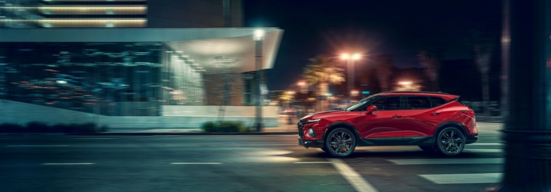 Red 2019 Chevy Blazer driving at night