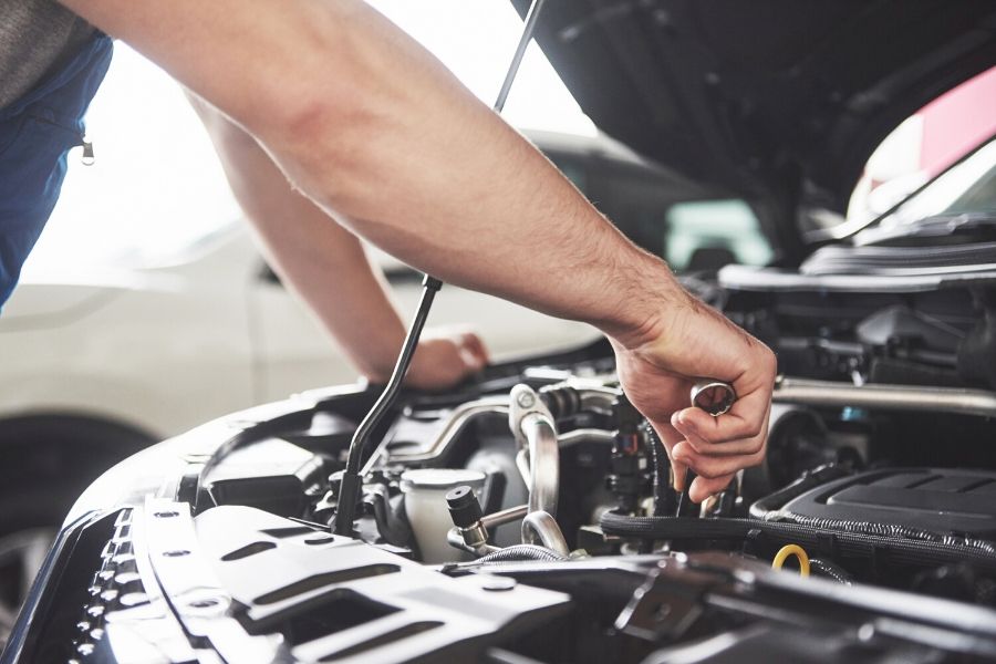 Mechanic working on engine
