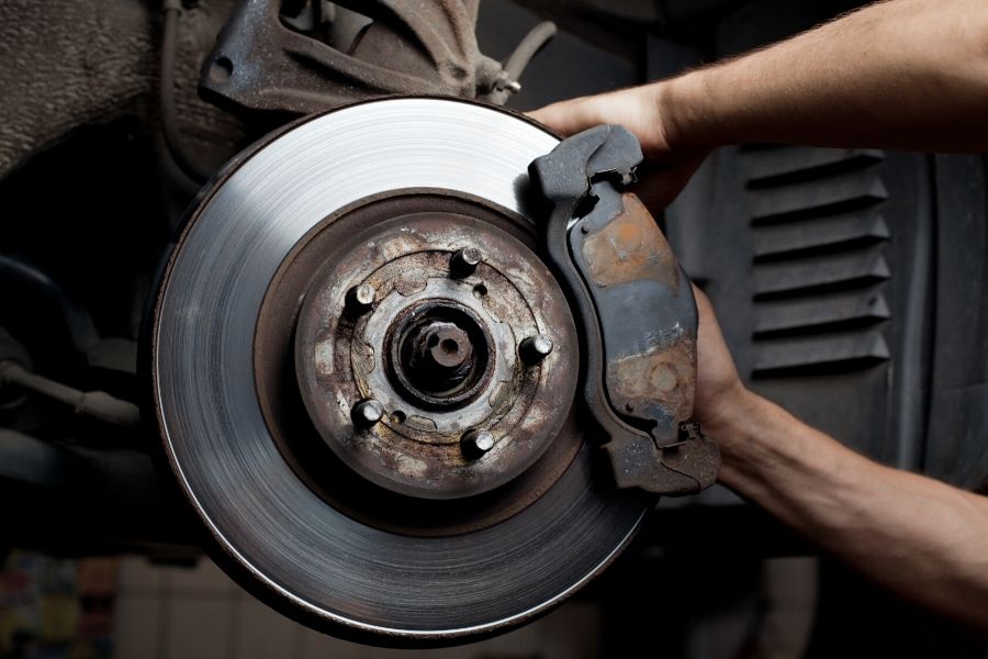 Mechanic changing brakes