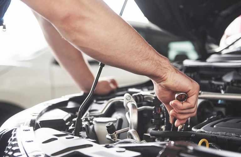 Mechanic working on engine