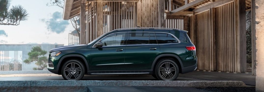 2021 Mercedes-Benz GLS Emerald Green Metallic parked outside the building