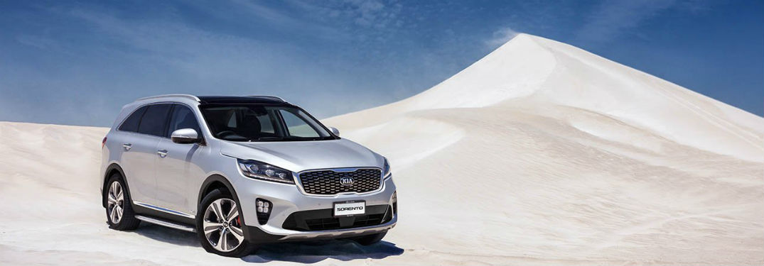 2019 Kia Sorento exterior front fascia and passenger side on sand dune