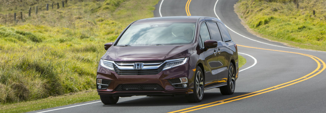 2019 Honda Odyssey driving on a curvy road