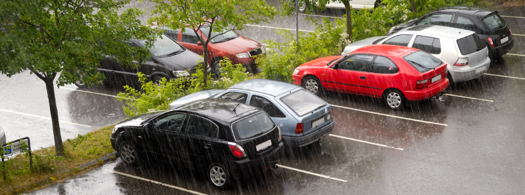 Vehicles parked in rain